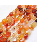 Carnelian. Nuggets Tumbled. 8~15x5~10 mm. 1 mm perforación. 40 uds aprox. 1 hilo.