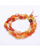 Carnelian. Nuggets Tumbled. 8~15x5~10 mm. 1 mm perforación. 40 uds aprox. 1 hilo.