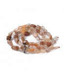 Cuarzo Rutilado. Nuggets Tumbled. 5~12x5~8 mm. 1 mm perforación. 45 uds aprox. 1 hilo.