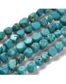 Howlite. Nuggets Tumbled. Teñidas térmicamente. 7~13x4~10x4~10 mm. 1.2 mm perforación. 45 uds hilo.