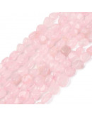 Cuarzo Rosa. Nuggets Tumbled. 6~8x8~10x3~8 mm. 1 mm perforación. 50 uds aprox. 1 hilo.