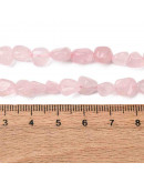 Cuarzo Rosa. Nuggets Tumbled. 6~8x8~10x3~8 mm. 1 mm perforación. 50 uds aprox. 1 hilo.