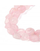 Cuarzo Rosa. Nuggets Tumbled. 6~8x8~10x3~8 mm. 1 mm perforación. 50 uds aprox. 1 hilo.