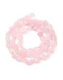 Cuarzo Rosa. Nuggets Tumbled. 6~8x8~10x3~8 mm. 1 mm perforación. 50 uds aprox. 1 hilo.