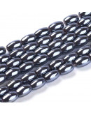 Hematite sintético. Gun Metal. Ovalado. 5x3 mm. 0.8 mm perforación. 70 uds aprox. 1 hilo.