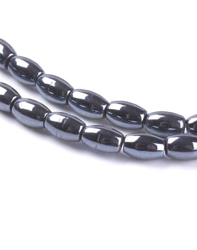Hematite sintético. Gun Metal. Ovalado. 5x3 mm. 0.8 mm perforación. 70 uds aprox. 1 hilo.
