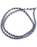 Hematite sintético. Gun Metal. Ovalado. 5x3 mm. 0.8 mm perforación. 70 uds aprox. 1 hilo.