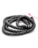 Hematite sintético. Gun Metal Mate. Rondelle. 4x2 mm. 1 mm perforación. 200 uds aprox. 1 hilo.