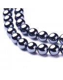 Hematite sintético. Grado AAA. Gun Metal. 08 mm diámetro. 1 mm perforación. 50 uds aprox. 1 hilo.